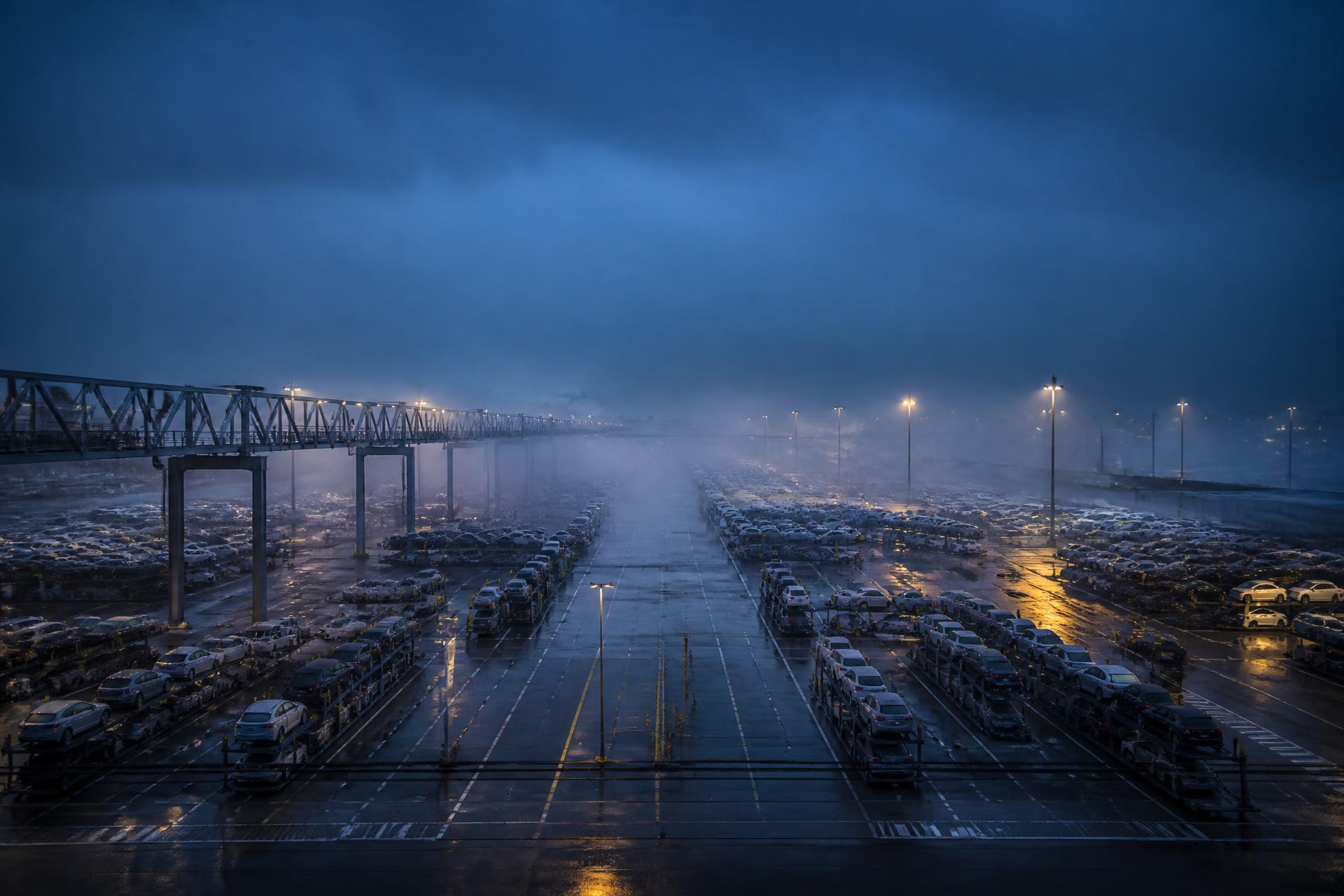 Automotive logistics terminal at blue hour